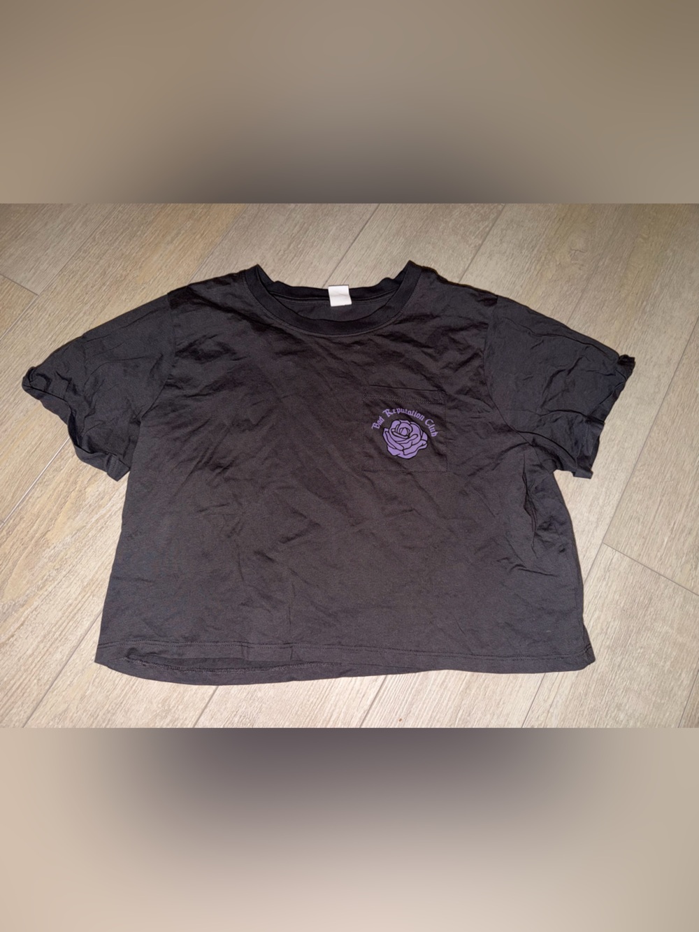 Woman's Bad Reputation Club Crop Top with Purple Rose Graphic